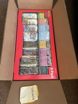 Pokemon Prismatic Evolutions 8 Mini-Tins with Promo Cards Costco 2-pack In Hand - Image 1