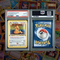 1999 Pokemon Fossil Dragonite Holo 1st Edition 4/62 PSA 8 - Image 1