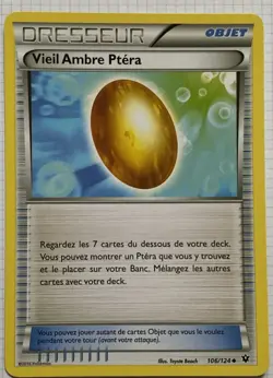 Carte Pokemon DRESSEUR 106/124 VIEIL AMBRE PTERA - Image 1