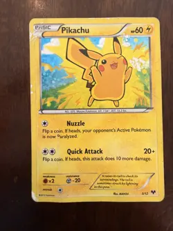 2013 Pokemon card Pikachu 5/12 holo McDonald in moderately played condition - Image 1