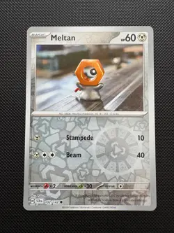 Pokemon TCG Meltan 102/142 Yuka Morii Reverse Holo Stellar Crown NM - Image 1