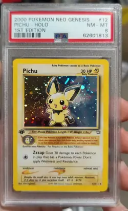 2000 Pokemon Neo Genesis 1st Edition Pichu Holo 12/111 PSA 8 Hand Swirl - Image 1