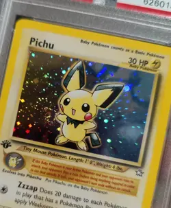 2000 Pokemon Neo Genesis 1st Edition Pichu Holo 12/111 PSA 8 Hand Swirl - Image 3
