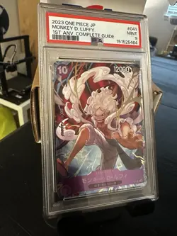 One Piece TCG: PSA 9 Monkey D Luffy P-041 1st Anniversary Complete Guide Edition - Image 1