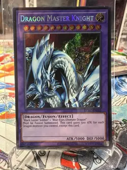 Yugioh Dragon Master Knight LCKC-EN065 Secret Rare 2025 Reprint NM - Image 1