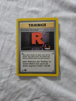 Pokemon Team Rocket’s Hideout 63/64 • 1st Edition • German • lp/mp • Vintage - Image 1