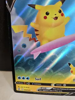 2021 Pokemon SWSH Celebrations Surfing Pikachu V 008/025 TCG Card - NM - Image 4