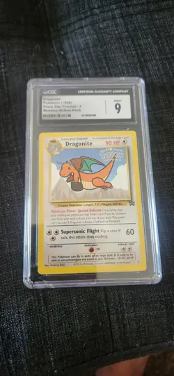 CGC 9 - 1999 Dragonite # 5 WB Movie WOTC Black Star PROMO Pokemon Card - Image 2