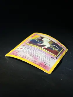 Vintage Pokemon TCG *damaged* “Mew” holo black star promo card creased - Image 3