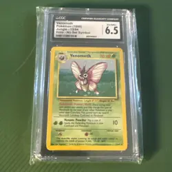 1999 POKEMON JUNGLE NO SET SYMBOL, HOLO #13/64 VENOMOTH CGC 6.5 - Image 1