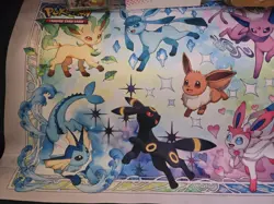 Pokemon Prismatic Evolutions Eevee Deck Box Sleeves, Card Frame, And Play Mat - Image 4
