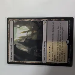 Wizards of the Coast MTG MKM Shadowy Backstreet Surveil Land Rare EN 268 - Image 1