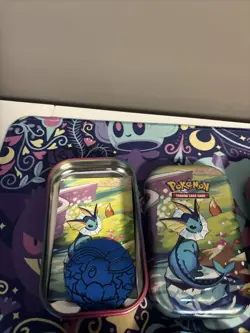 Pokemon Prismatic Evolutions Eeveelutions Mini Tin Full Set 8 Coins & Art - Image 3