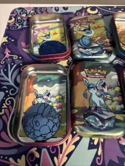 Pokemon Prismatic Evolutions Eeveelutions Mini Tin Full Set 8 Coins & Art - Image 4