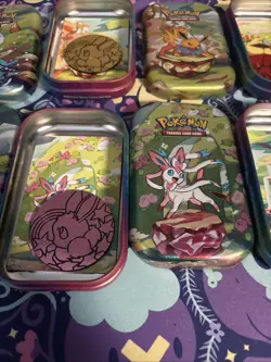 Pokemon Prismatic Evolutions Eeveelutions Mini Tin Full Set 8 Coins & Art - Image 5