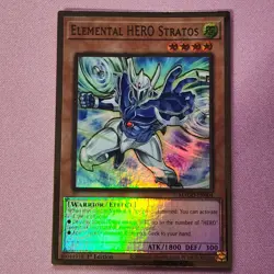 Yugioh Elemental HERO Stratos - Maximum Gold - MAGO-EN004 1st Edition - Image 1