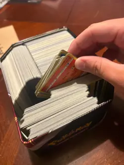 Pokemon card lot. Roughly 1,500 unsorted cards. Includes a mini binder with high - Image 3