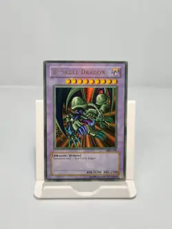 B. Skull Dragon MRD-018 Ultra Rare Yugioh Metal Raiders Low Fade Holo Bleed - Image 1