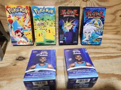 VHS Pokemon, Yu-Gi-Oh!, and new Lebron Space Jam Boxes Auction #74V - Image 1