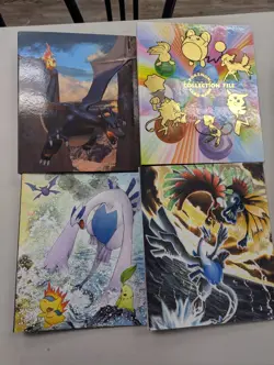 Pokemon Center Collection File Binder Lot Of 4 Charizard Lugia 1999-2020 - Image 1
