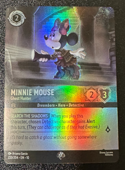 Disney Lorcana Whispers in the Well Minnie Mouse Ghost Hunter 220/204 Epic - Image 1