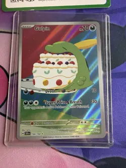 The Pokemon Company Gulpin 154/142 SV07 Stellar Crown Holo IR 70 HP Basic EN - Image 1