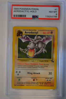 1999 POKEMON FOSSIL #1 AERODACTYL-HOLO PSA 8 FRESH GRADE - Image 1