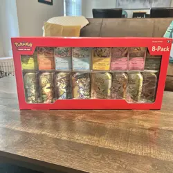 Pokemon TCG - Prismatic Evolutions 8 Mini-Tins w Promo Cards - Costco Exclusive - Image 1