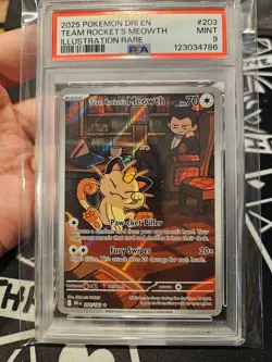 2025 POKEMON DRI EN-DESTINED RIVALS ILLUSTRATION RARE TEAM ROCKET'S MEOWTH PSA 9 - Image 1