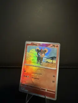 Litleo 015/131 Common Prismatic Evolutions Pokemon Near Mint Master Ball - Image 1