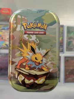 Pokemon TCG Prismatic Evolutions Mini Tin Sealed - ( Random Artwork ) - Image 1