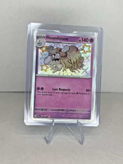 Pokemon TCG NM Houndstone 168/091 SV: Paldean Fates Holo 2024 - Image 1