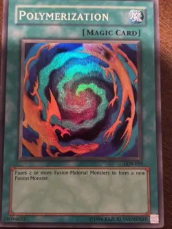 Yu-Gi-Oh! TCG Polymerization Spell-Normal Super Rare LOB-059 Holo Unlimited - Image 1
