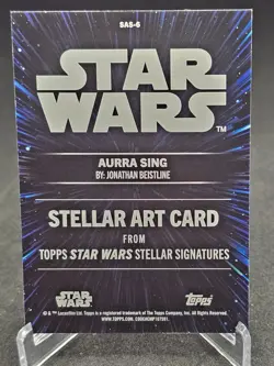 2025 Topps Star Wars Smugglers Outpost Aurra Sing /25 Orange Stellar Art #SAS-6 - Image 2