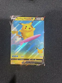 Pokemon Celebrations Surfing Pikachu v #008/025 Holo NM 200hp - Image 1