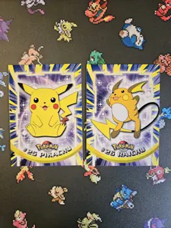 Pikachu #25/ Raichu #26 2000 Blue Topps Pokemon Series - Image 1