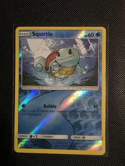 Pokemon TCG - Squirtle - 33/214 - Reverse Holo - Sun & Moon: Unbroken Bonds - LP - Image 1