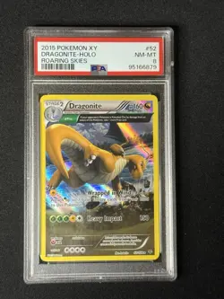 2015 POKEMON XY ROARING SKIES #52 DRAGONITE-HOLO PSA 8 - Image 1