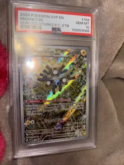 2024 POKEMON SVP SURGING SPARKS POKEMON CENTER ETB PROMO #159 MAGNETON PSA 10 - Image 1