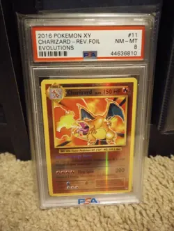 2016 Pokemon XY Evolutions Charizard Reverse Holo 11/108 PSA 8 - Image 1
