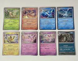 Pokemon TCG Scarlet & Violet: Prismatic Evolutions Costco Tin Cosmo Promo Cards - Image 1