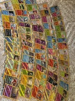 Lot of 75 Sun and Moon Era Pokemon Cards Lot ALL Holos and Reverse C/UN/R- LP-NM - Image 1