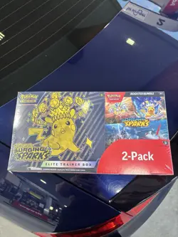 Pokemon TCG Surging Sparks ETB with Booster Bundle - Image 1