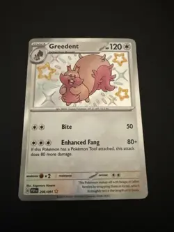 Pokemon TCG Greedent Baby Card Paldean Fates 206/091 Near Mint NM - Image 1