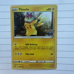Pikachu Cosmo Holo SWSH234 Pokemon Go Black Star Promo Light play - Image 1