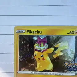 Pikachu Cosmo Holo SWSH234 Pokemon Go Black Star Promo Light play - Image 2