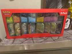 Pokemon TCG - Prismatic Evolutions 8 Mini-Tins w Promo Cards - Costco Exclusive - Image 1