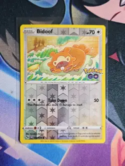 Pokemon Bidoof 059/078 Pokemon GO Reverse Holo Peelable Ditto English NM/lP+ - Image 1