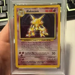1999 Pokemon Base Set Alakazam 1/102 Holo Rare English PSA 9 - Image 2