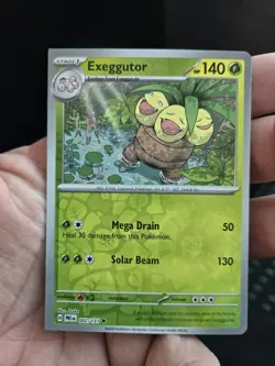 Exeggutor 002/131 Prismatic Evolutions- Rev.Holo - Error Card- Square/Round Cut - Image 1